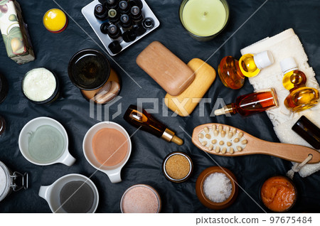 luxury Set of spa products with accessoires on black background. top view 97675484