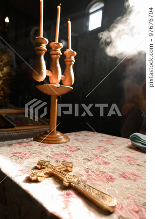 Sunlight lightens the iconostasis in the temple, 97676704