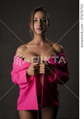 Alluring young woman in stylish outfit Alluring young woman in stylish outfit 97676782