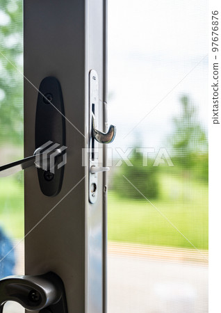 Handle, locking hardware, and jam to a sliding glass and screen door. Handle, locking hardware, and jam to a sliding glass and screen door. 97676876