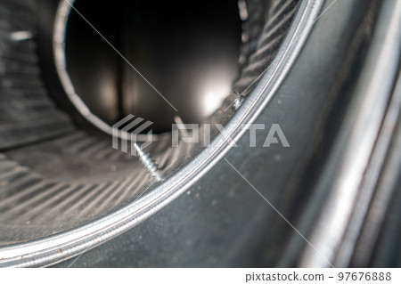Interior view of residential HVAC galvanized metal duct piping Interior view of residential HVAC galvanized metal duct piping 97676888