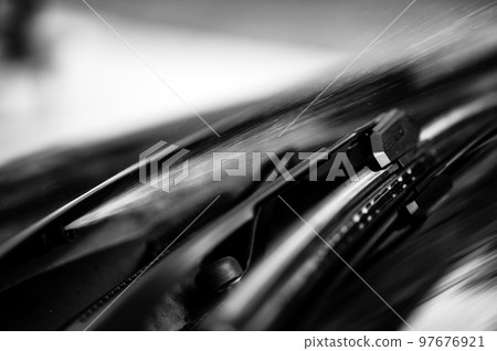 Under hood windshield washer jet used to spray liquid to clean glass on a vehicle. Under hood windshield washer jet used to spray liquid to clean glass on a vehicle. 97676921