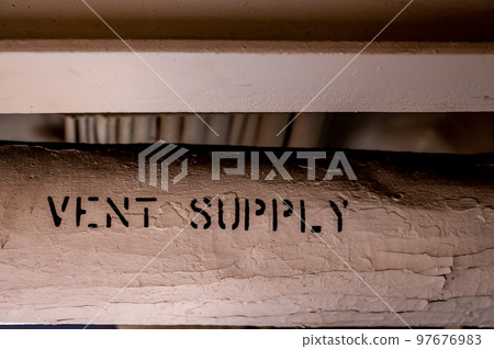 Ventilation supply line with a thermal wrapping inside an industrial area. 97676983