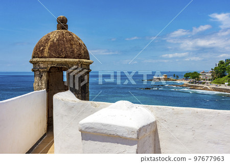 Wall and guardhouse of an old historic fort on the edge of the city of Salvador Wall and guardhouse of an old historic fort on the edge of the city of Salvador 97677963