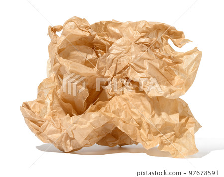 Crumpled brown sheet of paper isolated on white background Crumpled brown sheet of paper isolated on white background 97678591