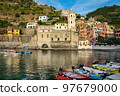 View of the bay and Church of St. Margaret of Antioch in the village Vernazza, Cinque Terre, Italy.  97679000