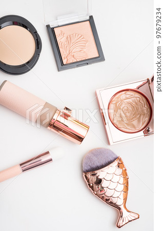 Set of luxury cosmetics for fashion make up on white background Set of luxury cosmetics for fashion make up on white background 97679234