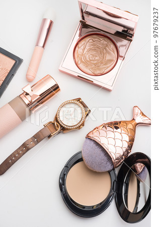 Set of luxury cosmetics for fashion make up  on white  background. pink gold. 97679237