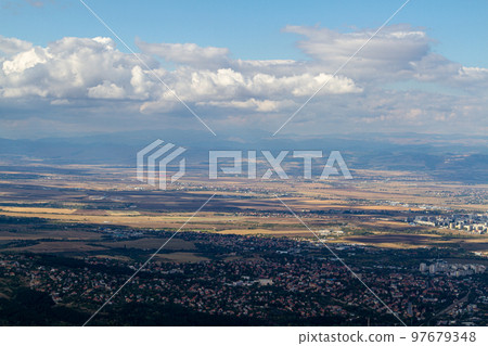 Aerial view of the city of Sofia, Bulgaria. The capital of Bulgaria is located in the west of the country at the foot of the Vitosha mountain range. History of city has more than two thousand years. Aerial view of the city of Sofia, Bulgaria. The capital of Bulgaria is located in the west of the country at the foot of the Vitosha mountain range. History of city has more than two thousand years. 97679348