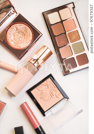 Set of luxury cosmetics for fashion make up on white background Set of luxury cosmetics for fashion make up on white background 97679387