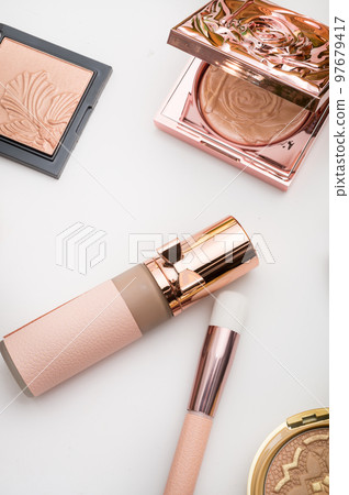 Set of luxury cosmetics for fashion make up on white background Set of luxury cosmetics for fashion make up on white background 97679417
