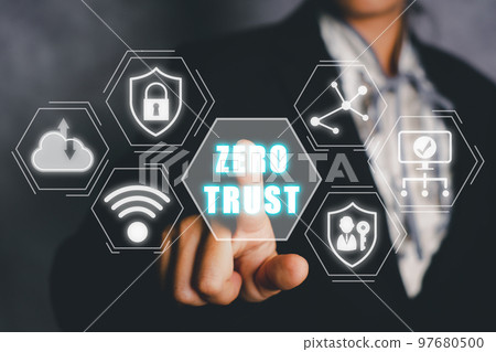 Zero trust security concept, Person hand touching zero trust icon on virtual screen. Zero trust security concept, Person hand touching zero trust icon on virtual screen. 97680500