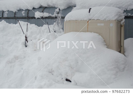 Kerosene tank buried in snow - stock photo 97682273