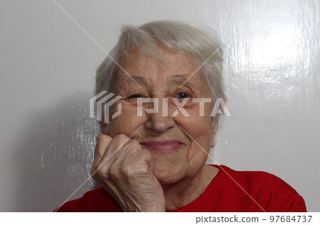 Portrait of happy senior woman laughing isolated on white studio background. Human emotions concept. emotional old lady standing indoor Portrait of happy senior woman laughing isolated on white studio background. Human emotions concept. emotional old lady standing indoor 97684737