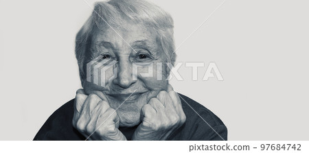 Black and white portrait of smiling old senior great-grandmother close up Black and white portrait of smiling old senior great-grandmother close up 97684742