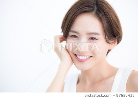 Beauty image Portrait of a woman wearing a tank top Beauty image Portrait of a woman wearing a tank top 97685435