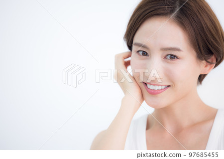 Beauty image Portrait of a woman wearing a tank top Beauty image Portrait of a woman wearing a tank top 97685455