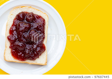 Sliced bread with strawberry jam Sliced bread with strawberry jam 97687445