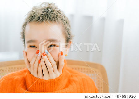 Belly short woman wearing orange knit 97687920