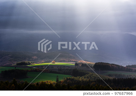 Biei, Hokkaido, morning light coming through the clouds, Japan 97687966