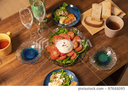 Japanese dining table; caprese; prata; mozzarella; cheese Japanese dining table; caprese; prata; mozzarella; cheese 97688095