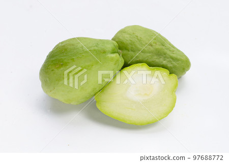 Fresh chayote fruit on white background. Fresh chayote fruit on white background. 97688772