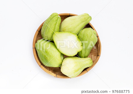 Fresh chayote fruit on white background. Fresh chayote fruit on white background. 97688775