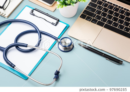 Doctor desk with medical stethoscope and laptop Doctor desk with medical stethoscope and laptop 97690285
