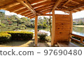 Relaxing time in the Japanese garden 97690480