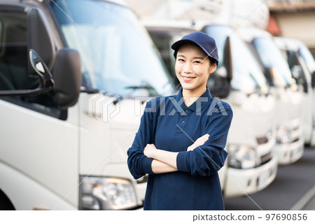 Young female worker in the delivery industry (arms folded) 97690856
