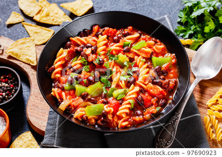 Black Bean Soup with spiral pasta and vegetables Black Bean Soup with spiral pasta and vegetables 97690923