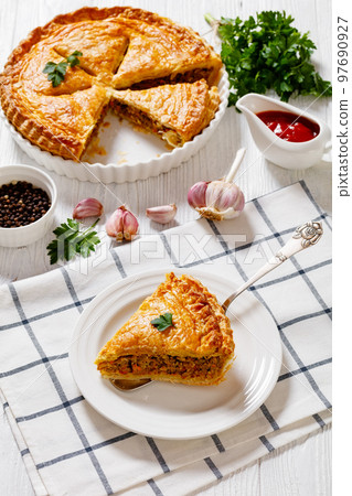 Ground Beef Meat Pie on white wooden table Ground Beef Meat Pie on white wooden table 97690927