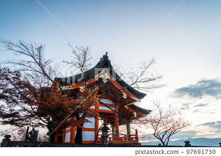 japanese pagoda stand against in autumn season japanese pagoda stand against in autumn season 97691730