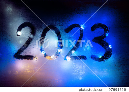New year background of misted glass. 2023 numbers New year background of misted glass. 2023 numbers 97691836