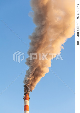 White thick smoke from the boiler room chimney. Industrial zone. 97692775