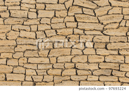 Sand color stone or brick wall, modern texture background 97693224
