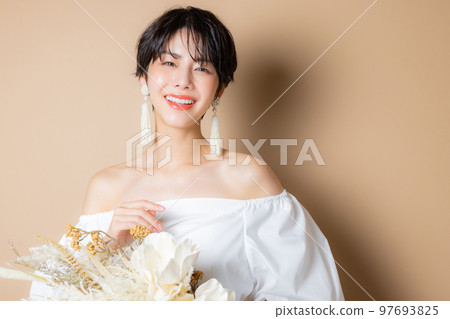 A woman with short hair A woman with short hair 97693825