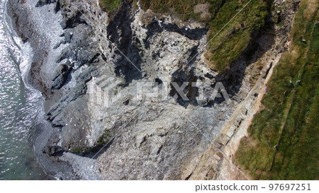 The coast of the Celtic Sea from a bird's-eye view. The rocky shores of Ireland. Aerial photo. The coast of the Celtic Sea from a bird's-eye view. The rocky shores of Ireland. Aerial photo. 97697251