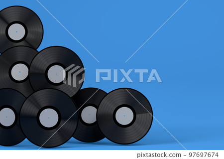 Set of vinyl LP records with label isolated on blue background. 97697674