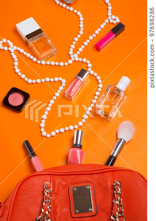flat lay fashionable lady set around orange background flat lay fashionable lady set around orange background 97698286