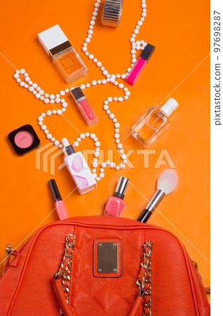 flat lay fashionable lady set around orange background 97698287