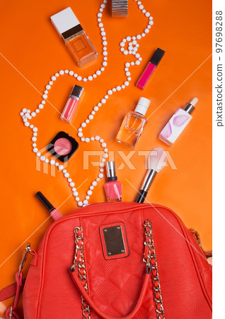 flat lay fashionable lady set around orange background flat lay fashionable lady set around orange background 97698288