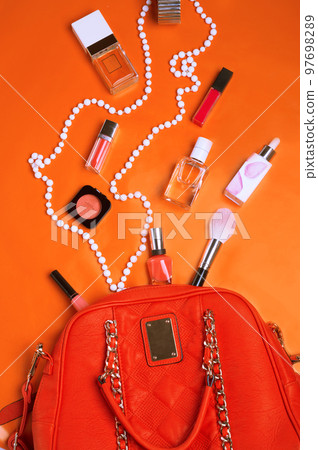 flat lay fashionable lady set around orange background 97698289