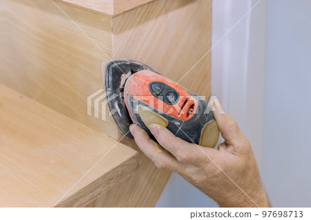 Refinishing of railing trim in new home using handrails grinding polishing machine Refinishing of railing trim in new home using handrails grinding polishing machine 97698713