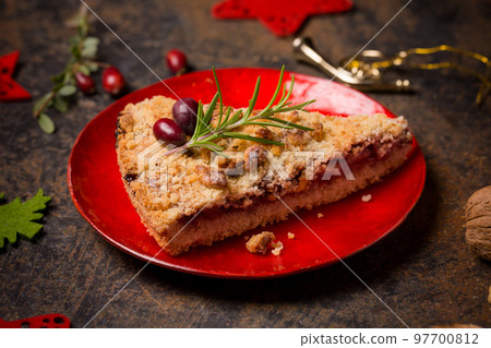 A piece of grated walnut cake 97700812