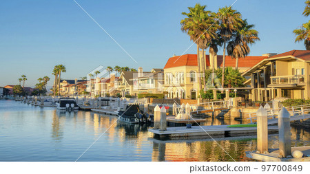 Intracoastal houses with boats and docks at the front at Coronado, San Diego, California 97700849