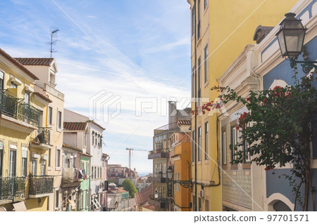 Colorful old street in Lisbon 97701571