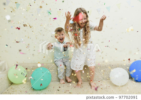 Confetti colorful rain on a birthday celebration 97702091