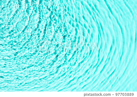 Turquoise water texture background, water surface with sun rays reflection, high resolution. Turquoise water texture background, water surface with sun rays reflection, high resolution. 97703889