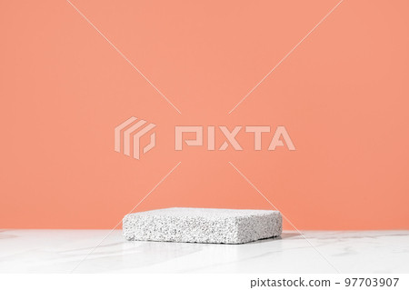 Empty podium for cosmetics beauty product presentation. Made with pumice stone on a bathroom table. Front view. 97703907